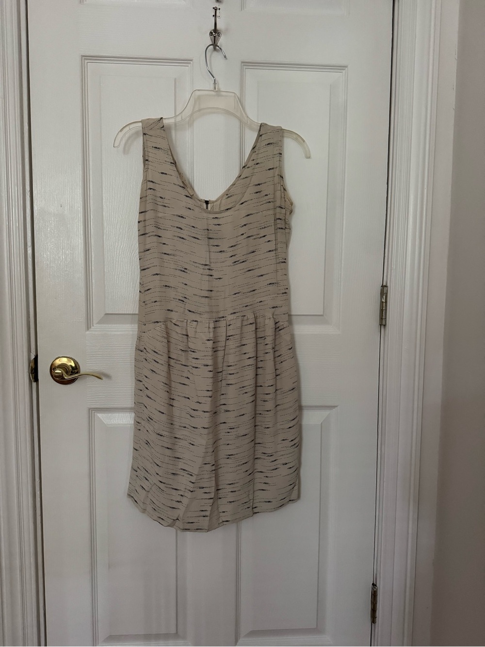 Sleeveless Beige Mini Dress with Navy Speckle Detail